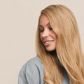 Golden blonde hair color on a naturigin model