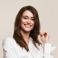 light brown hair color on a smilling person